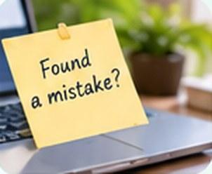 A sticky note saying Found a mistake?