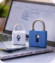 Padlocks in front of a laptop